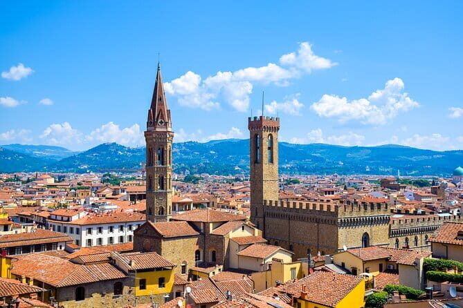 Discover Florence city center on e-cabriot fiat 500 - Santa Croce in a Hurry: Marble Facade and Nearby Craft Shops