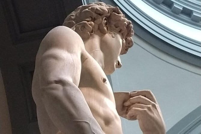 Enjoy Michelangelo's David Tour - Standing at the Feet of David in the Accademia