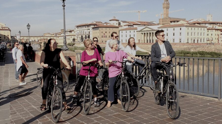 Florence: 2-Hour Guided Bike Tour - Meeting at via Cavour and getting setup: bike, helmet, headsets