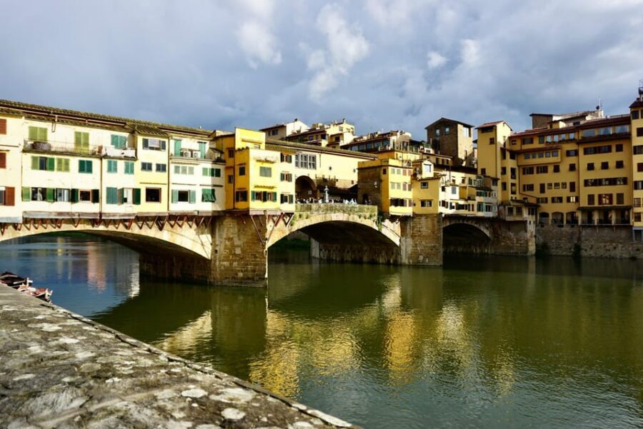 Florence: 60-Minute Eco-Friendly Golf Cart City Tour - Ognissanti district: city walls and Florentine traditions