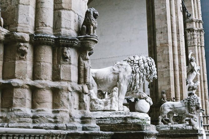 Florence City Center Exclusive Guided Tour w/ Accademia & David - Palazzo Vecchio: Civic Power With a Lot of Stone Attitude