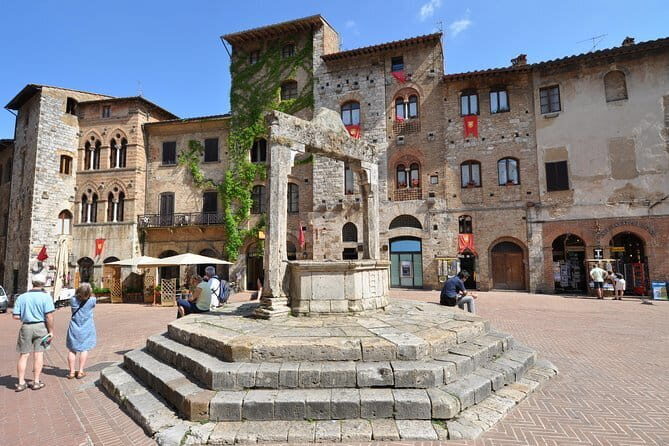 Florence Day Trip to Volterra and San Gimignano - San Gimignano towers, Vernaccia wine, and saffron history