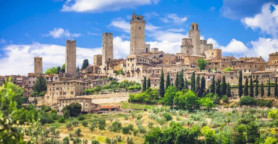 Florence: San Gimignano & Volterra Day Trip with Food & Wine - Winery lunch outside Volterra: food, views, and wine tastings built into the day