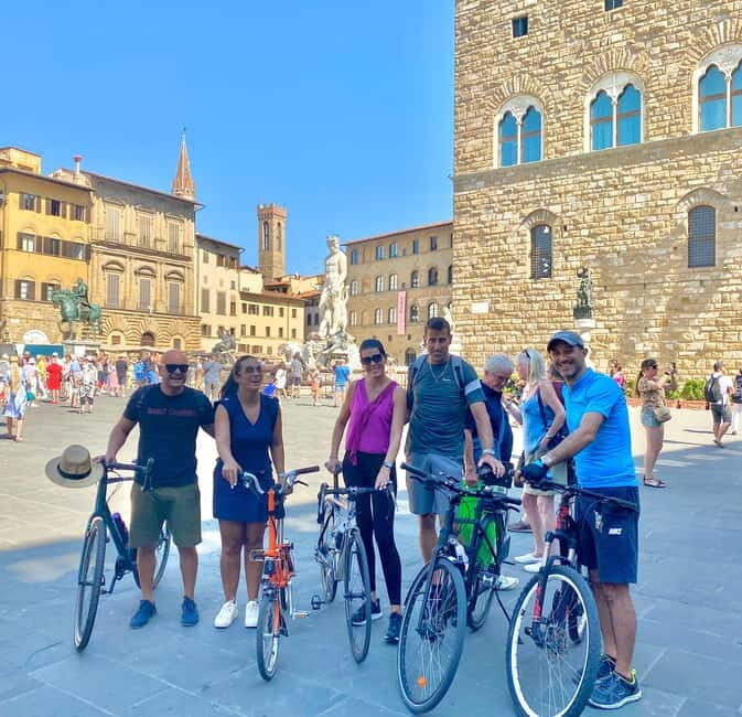 Florence: Untold Bike tour with Roberto - Via de’ Tornabuoni, Wine Windows, and Market Stops