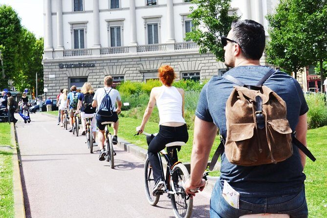 Highlights of Florence Bike Tour (E-bike Upgrade Available) - Santo Spirito: local morning life, markets, and the Michelangelo learning-story