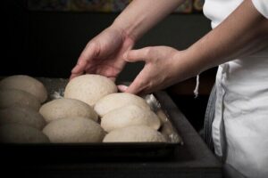 Pizza Making Private Class with Wine Tasting - The Real Learning: Dough, Rolling, Sauce, and Oven Control