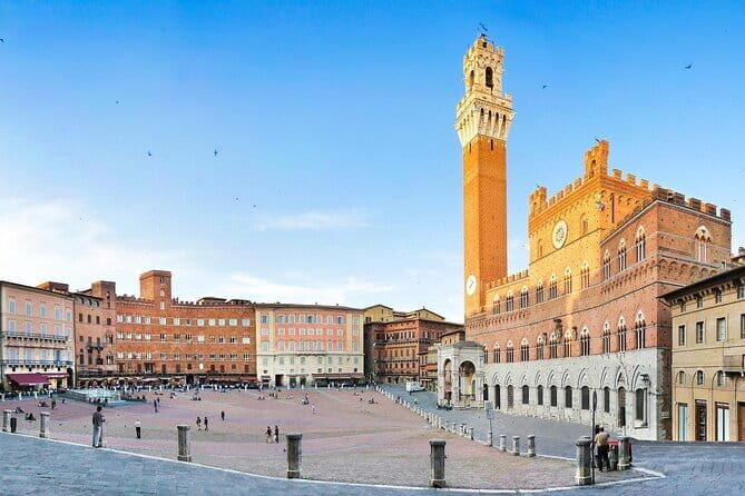 Private Best of Tuscany Hill Towns Tour with lunch from Florence - Siena on foot: Palio atmosphere, contrade corners, and timed wandering